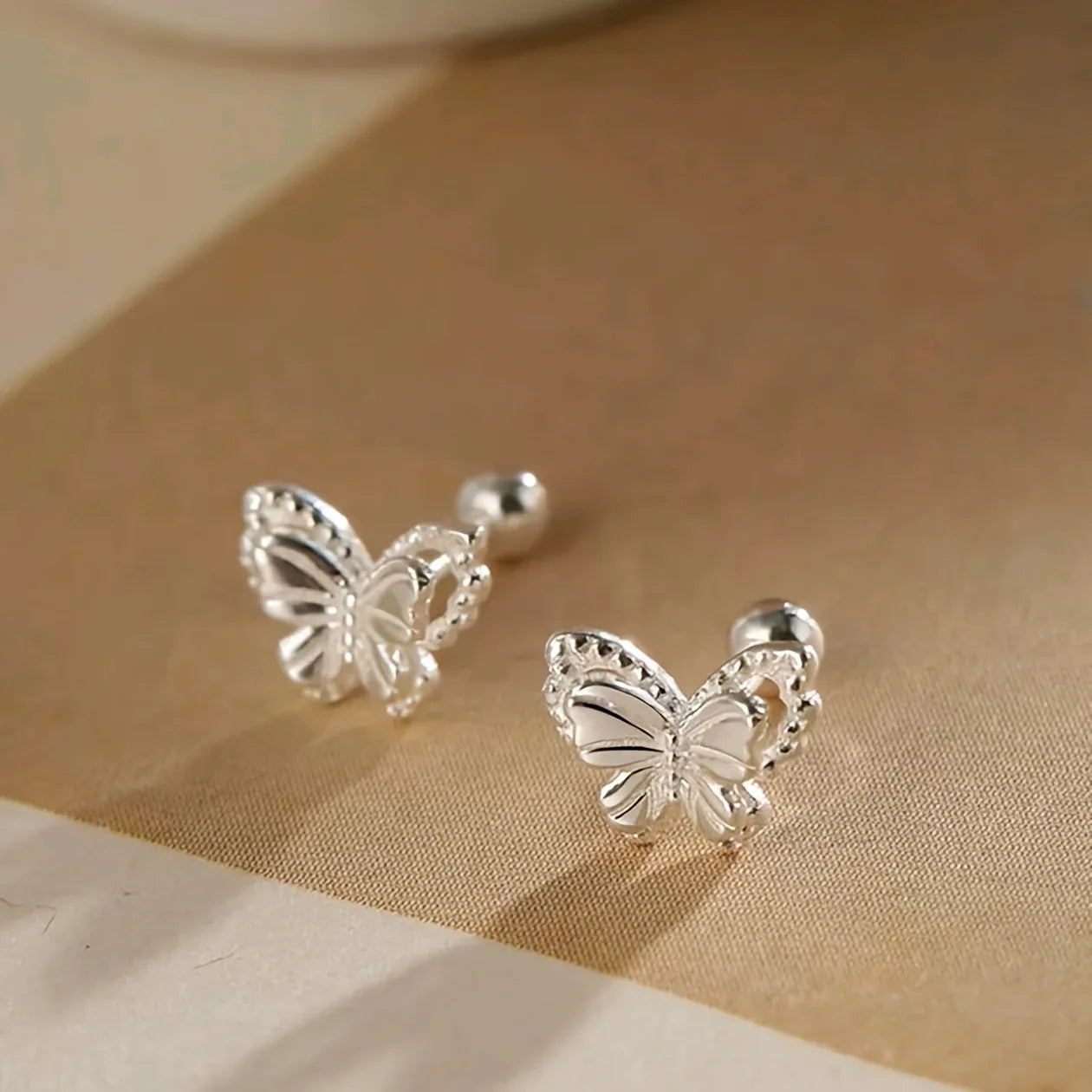 TEMU-A pair of ladies' fashionable hollow butterfly stud earrings - alotasawkli