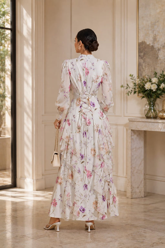 A dress with a soft floral pattern that embodies femininity and sophistication in every detail