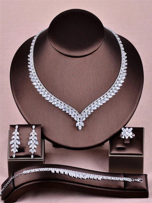 CORUIXI طقم قلادة على شكل حرف V مرصعة بالزركونيا للنساء، مجوهرات فضية فاخرة عصرية، 4 قطع من الاكسسوارات مناسبة للزفاف والحفلات والمناسبات الرسمية والهدايا - alotasawkli