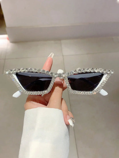 SHEIN-A single pair of women's sunglasses with a black cat-eye frame adorned with rhinestones - alotasawkli