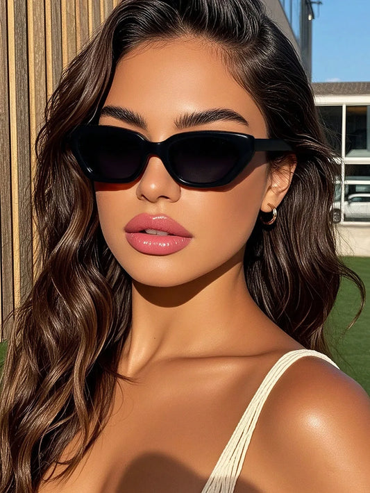 SHEIN-A pair of black frame cat-eye sunglasses for men and women - alotasawkli