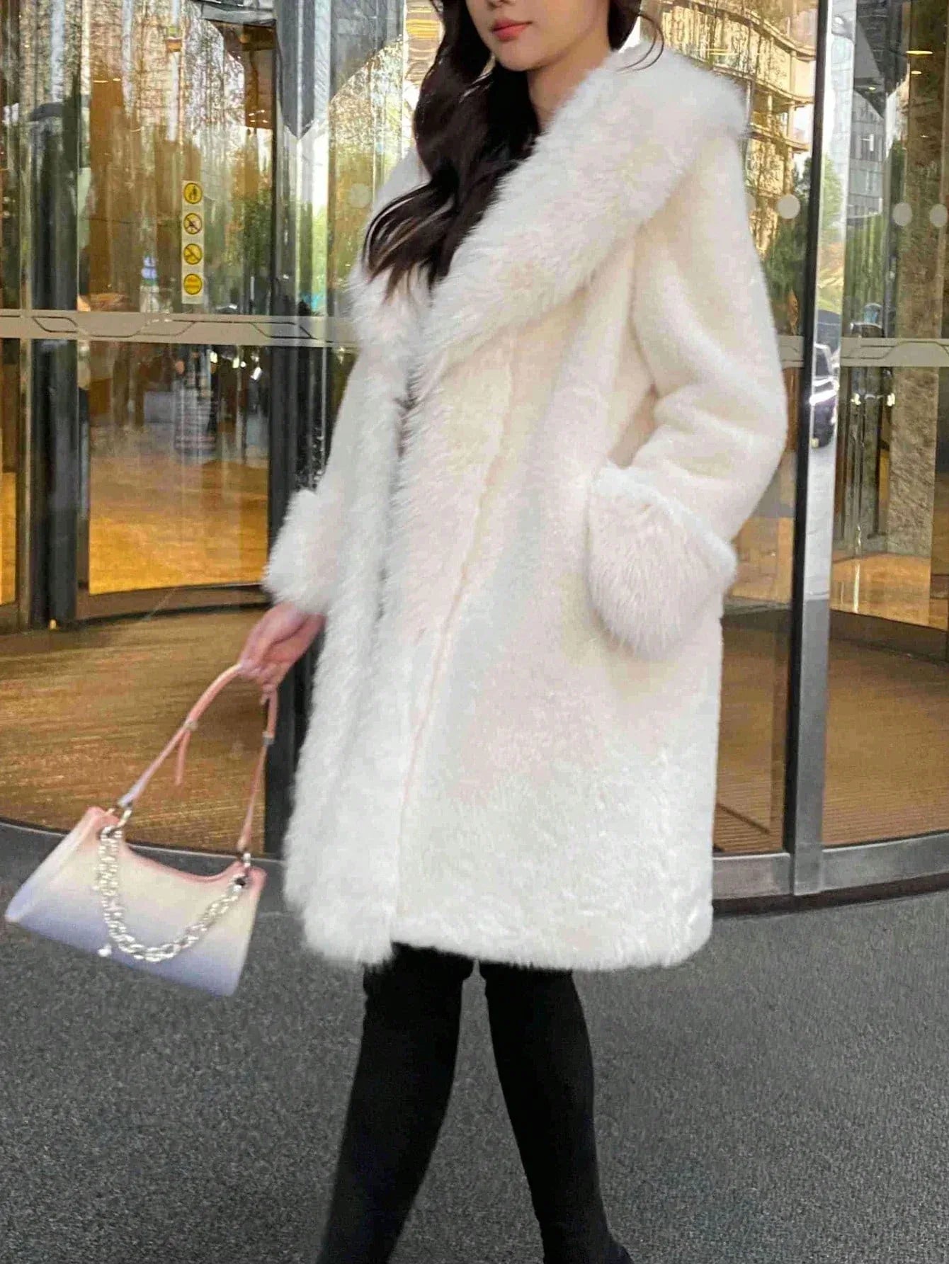 SHEIN-A luxurious, solid-color faux fur coat with a long collar - alotasawkli