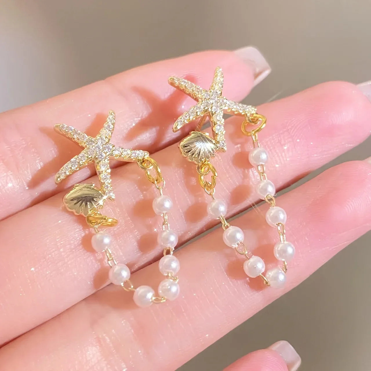 Pair of Starfish Shell Ocean Style Earrings - 18K Golden Plated Zinc - alotasawkli