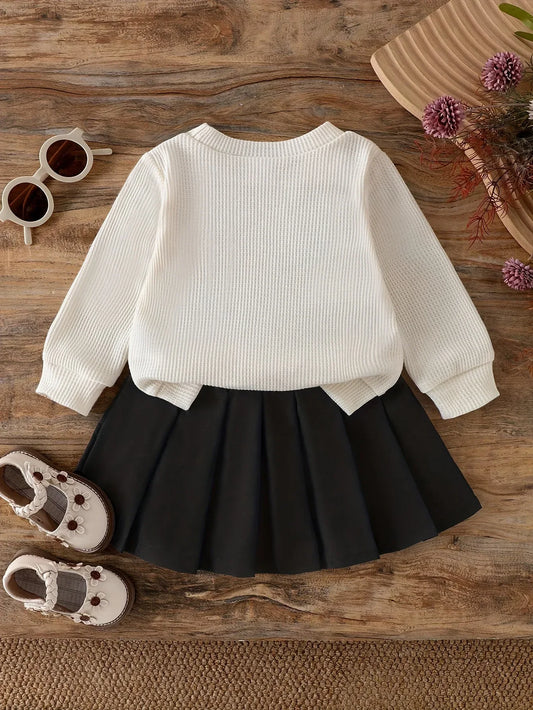 A Two-Piece Set for Baby Girls Featuring a Round-Neck Long-Sleeve T-Shirt Adorned with Multiple Black 3D Bow Decorations And a Solid Black Pleated Skirt, for Outdoor - alotasawkli
