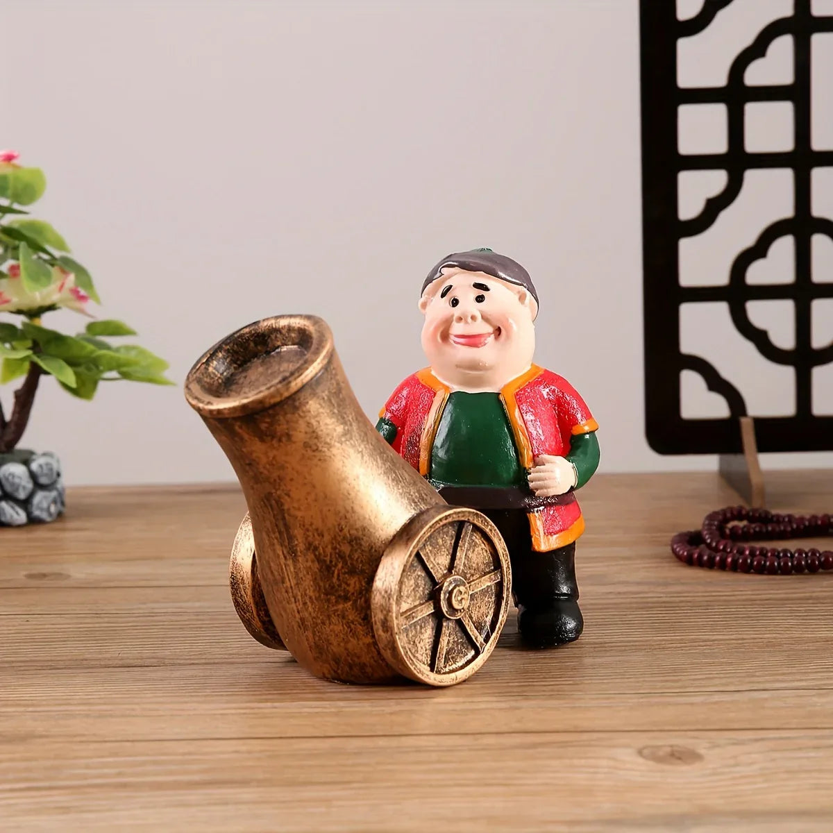 TEMU-A Resin Figure of a Chubby Old Man with a Cannon - alotasawkli