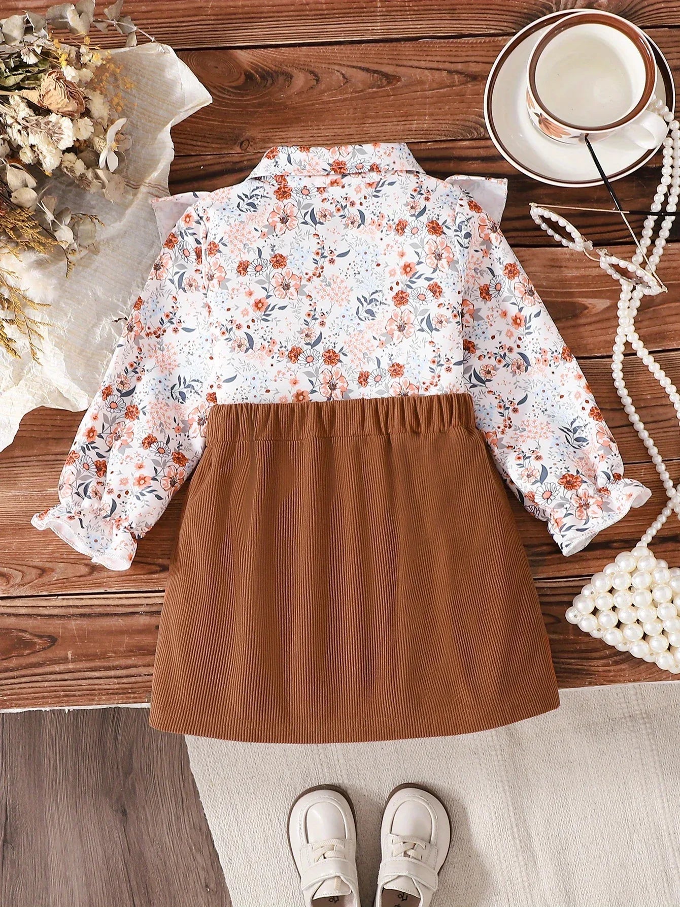 A Cute Outfit for Girls Featuring a Long-Sleeve Top with a Floral Print, Button- Collar, And Ruffled Design, Perfect for Spring And Autumn, Paired with a Khaki Bow Short Skirt, for Outdoor - alotasawkli