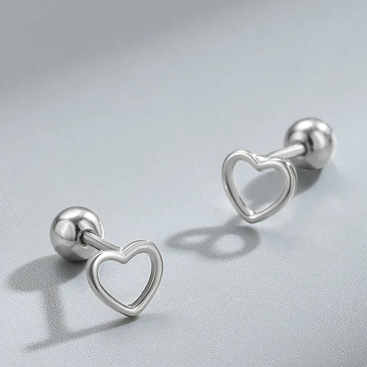 TEMU-A Set of Hollow Heart-Shaped Stud Earrings - alotasawkli