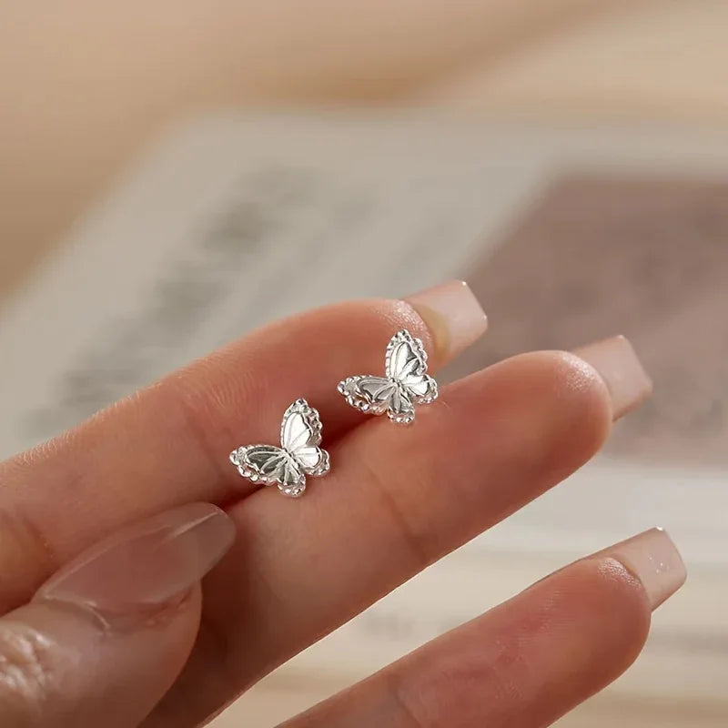 TEMU-A pair of ladies' fashionable hollow butterfly stud earrings - alotasawkli