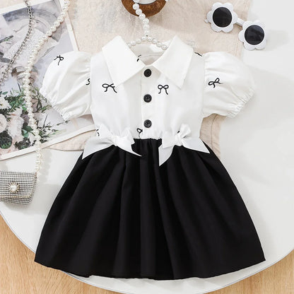 1pc Elegant Sweet Cool Style Baby Girl Dress | Black and White Contrast with Large Skirt, Non-Stretch Fabric, Random Print, Perfect for Spring/Fall - alotasawkli