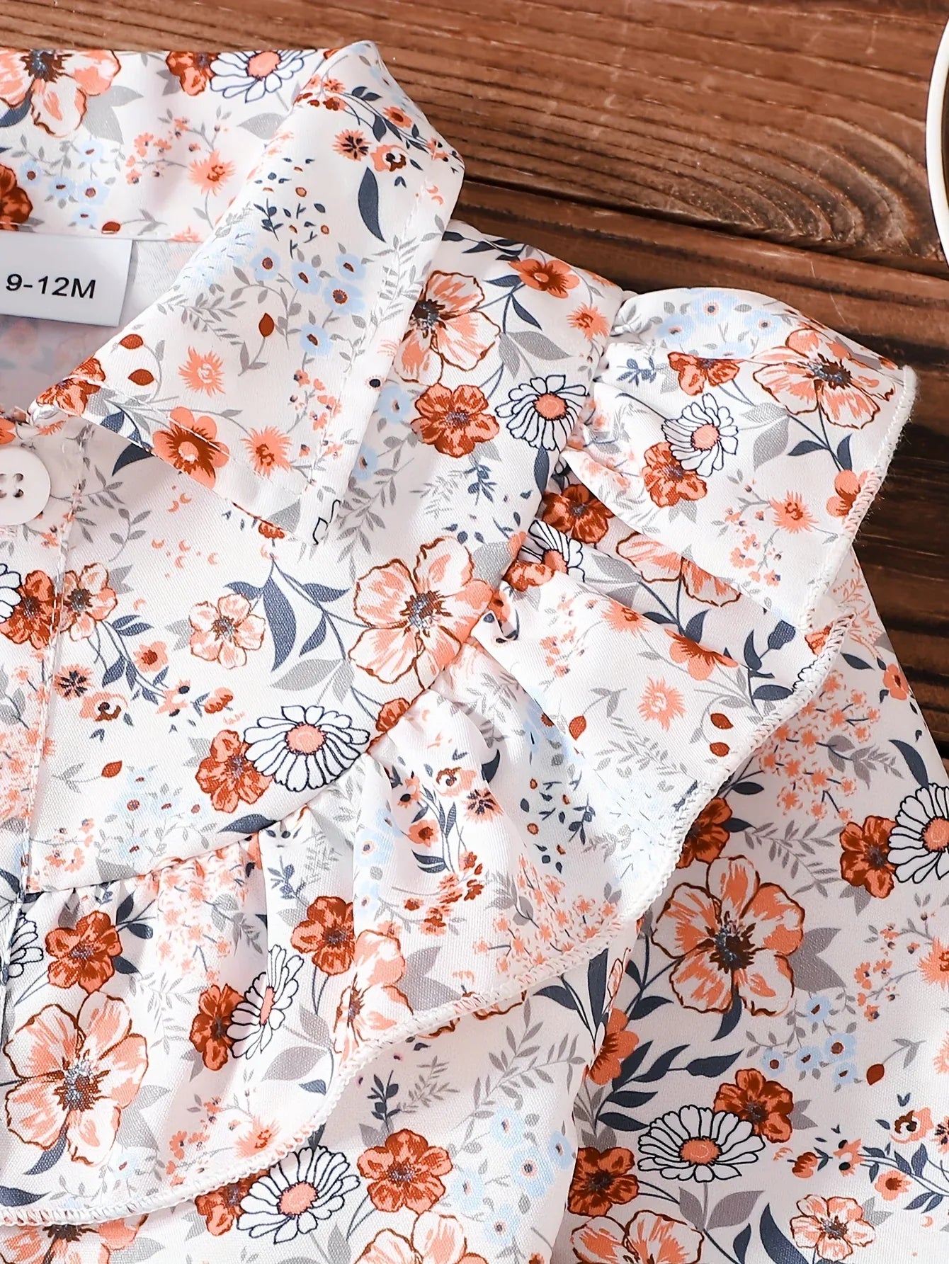 A Cute Outfit for Girls Featuring a Long-Sleeve Top with a Floral Print, Button- Collar, And Ruffled Design, Perfect for Spring And Autumn, Paired with a Khaki Bow Short Skirt, for Outdoor - alotasawkli