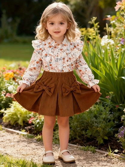 A Cute Outfit for Girls Featuring a Long-Sleeve Top with a Floral Print, Button- Collar, And Ruffled Design, Perfect for Spring And Autumn, Paired with a Khaki Bow Short Skirt, for Outdoor - alotasawkli